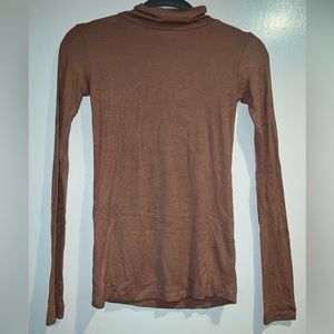 Soft cotton cowl neck long sleeve t-shirt.